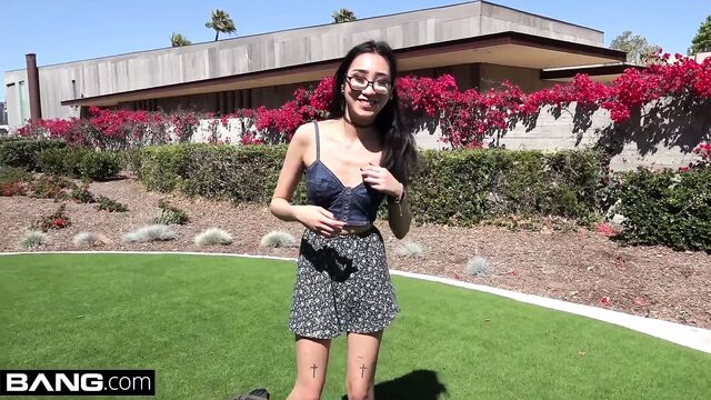 Nerdy teen asian Eva Yi flashes her tits in public