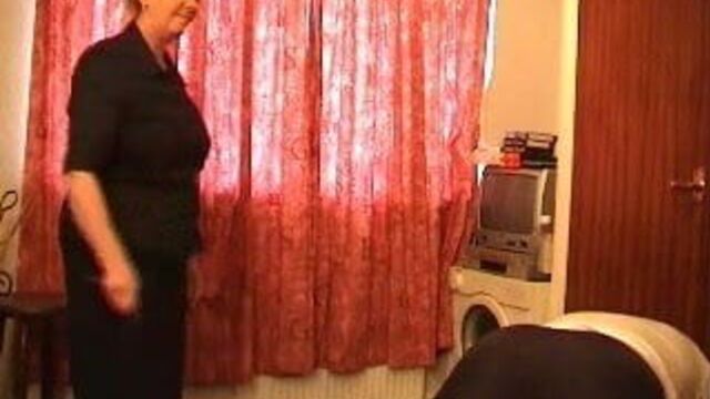 She Uses a Tawse on Him