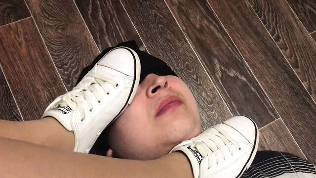 Slave licks the soles and shoes of the mistress