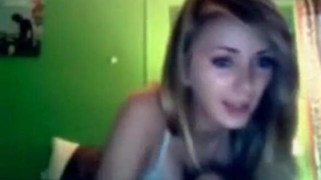 Angelic face cute college girl on her webcam