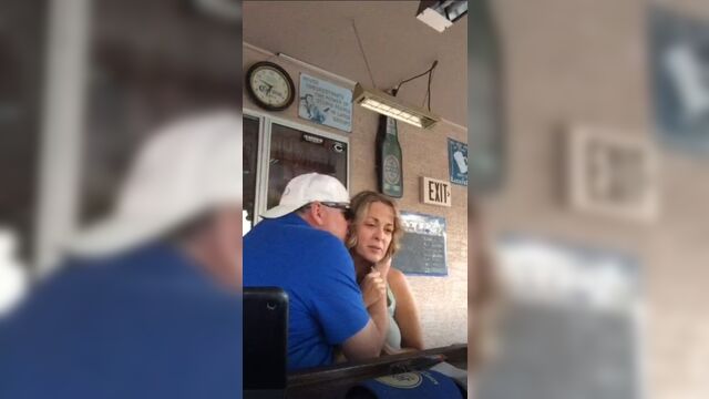 Mature woman shows her tits to the public with her friends