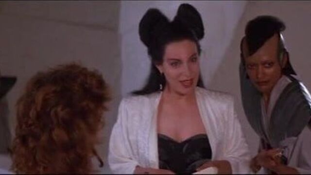 Tawny Kitaen nude in Gwendoline