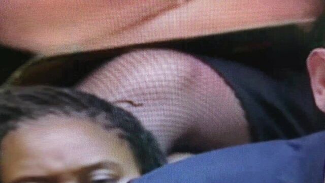 Crossing legs in fishnet in House of commons.