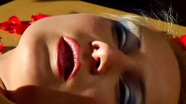 Blonde with blue eye makeup gets fucked hard