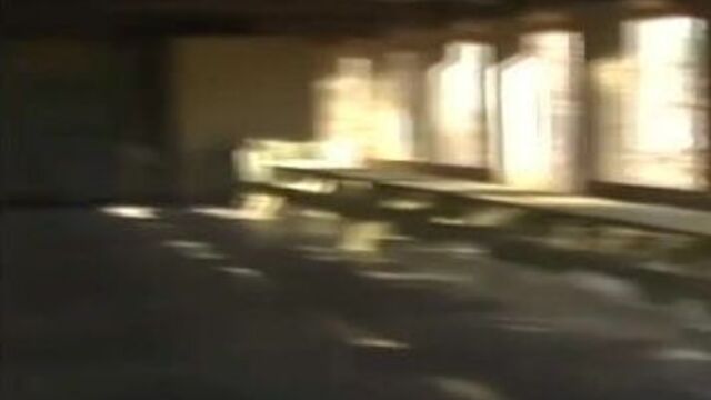 Kitty playing in a football jersey and miniskirt